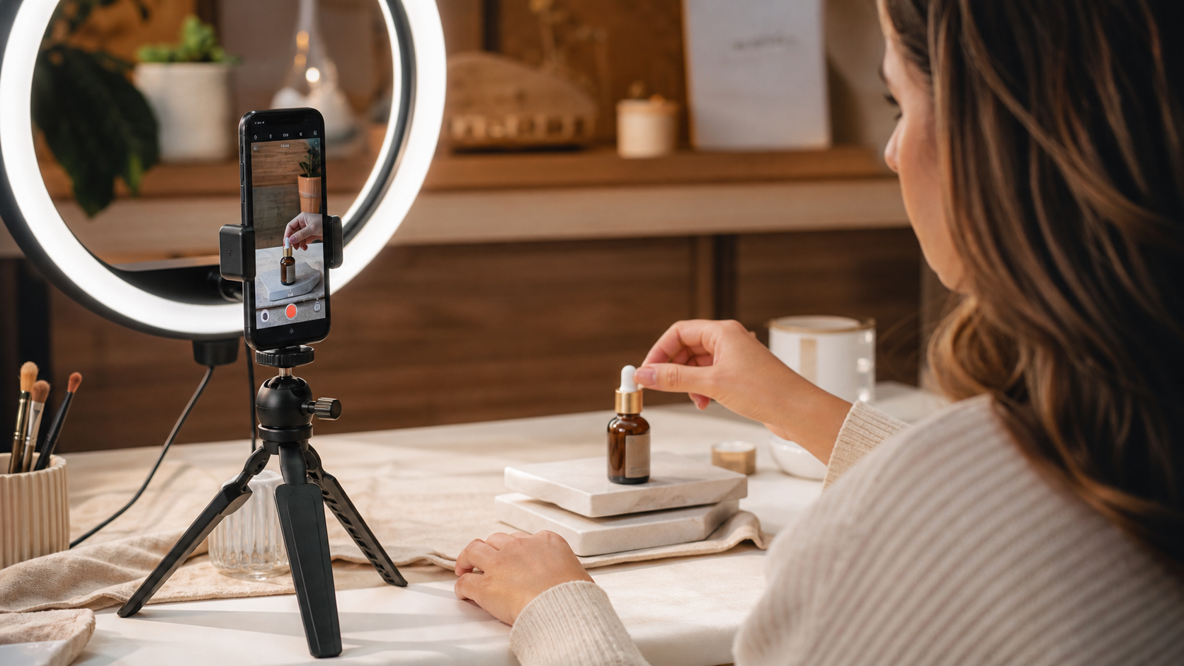 Creator filming vertical social media content with a phone and studio light